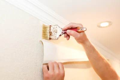 Pose de papier peint aux Authieux-du-Puits — revêtements muraux et toiles de verre